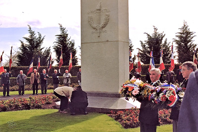 Brittany American Cemetery 2004 Memorial Day - Dad and Patrick Davis, son of the former director of Brittany American Cemetery, lay the American wreath at the monument.